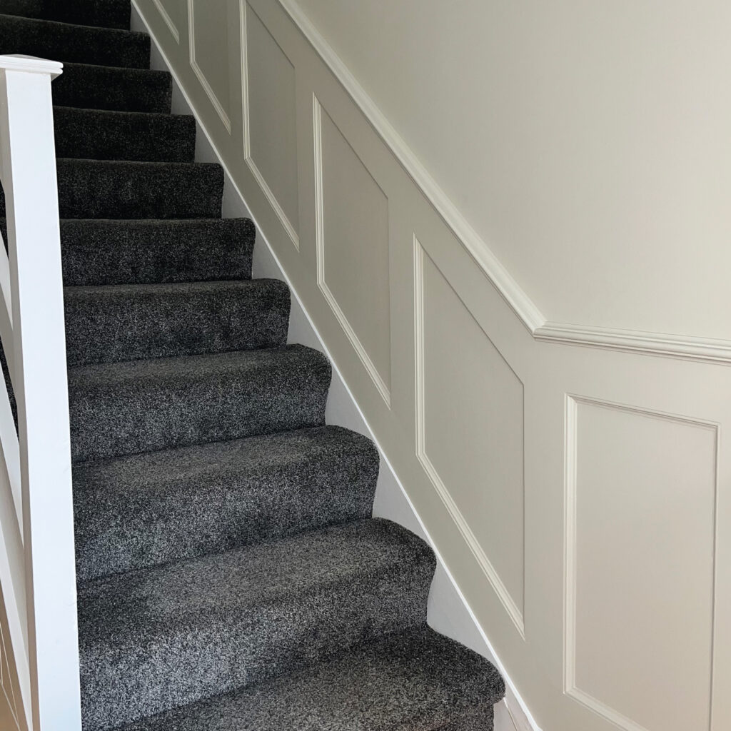 Bespoke white panelling for staircase, College Park County Dublin - McIntyre Carpentry